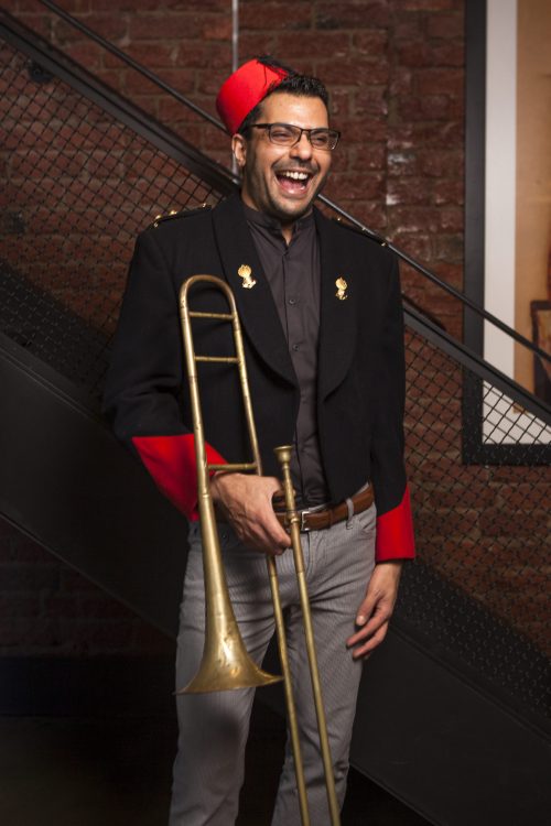 Rajiv Panchal standing with Trombone